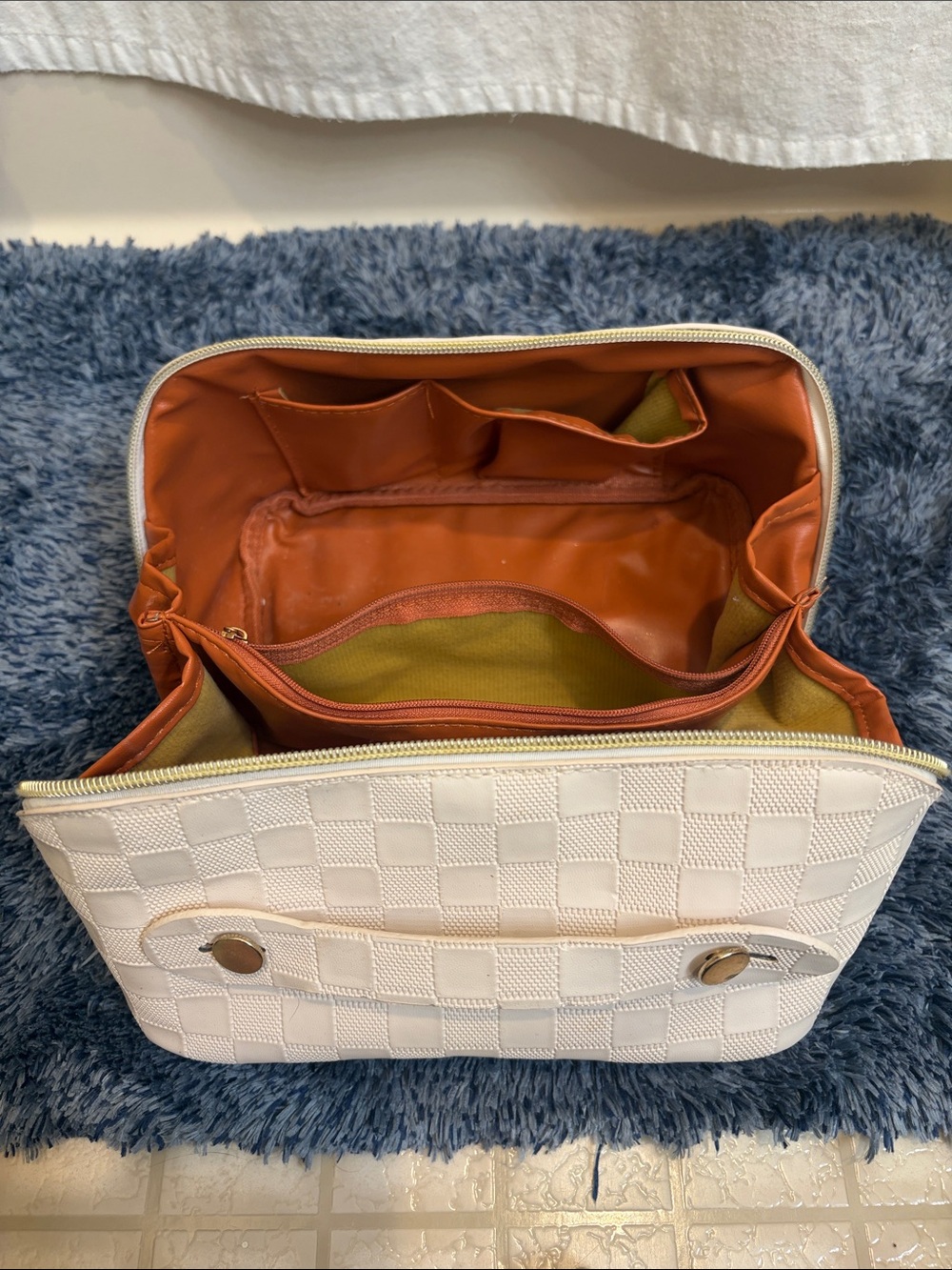 White Checkered Women's Cosmetic Bag with Orange Interior